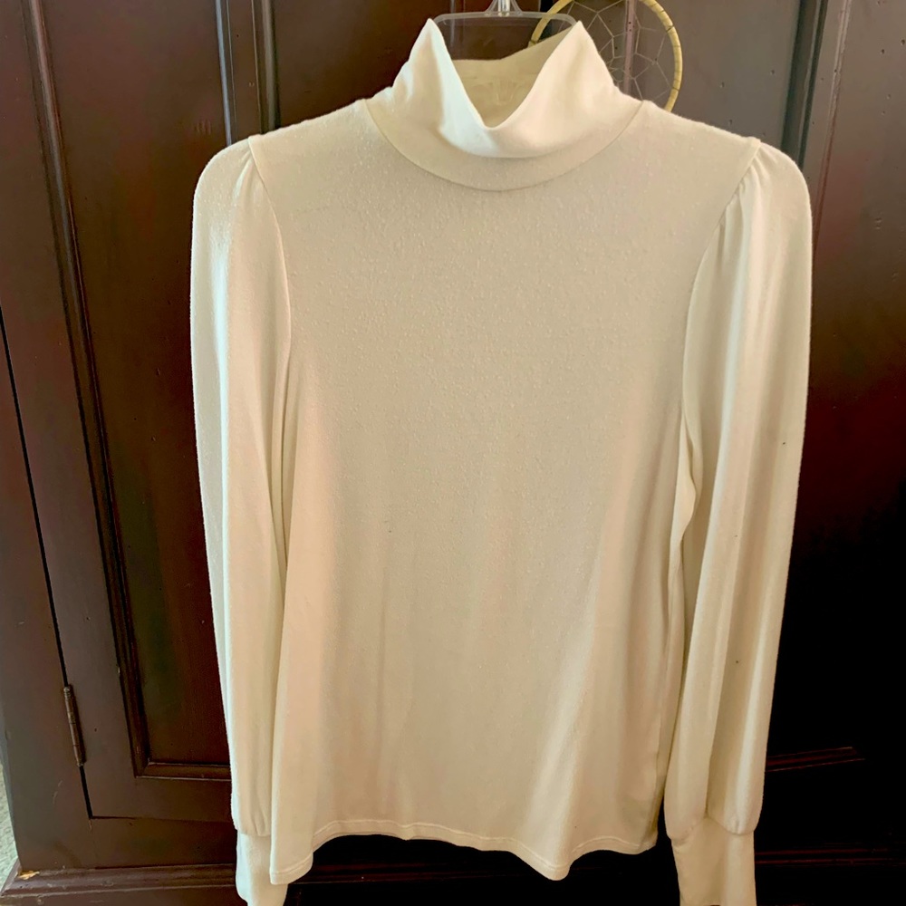 Soft white loose fitting turtleneck